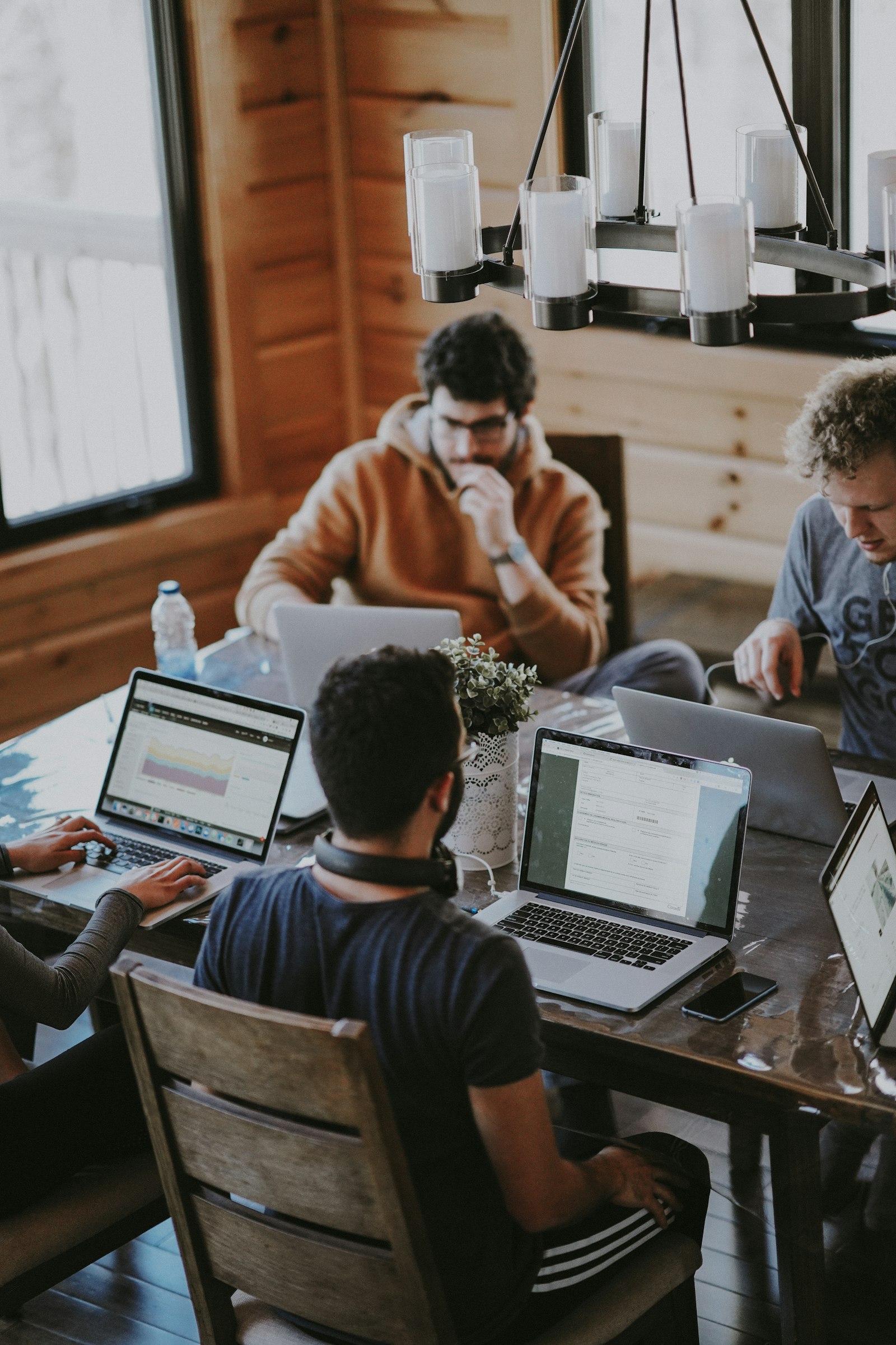 The team working together around a table